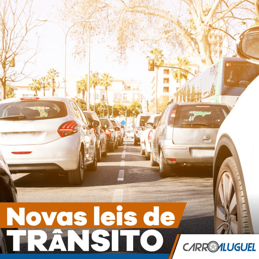 Imagem de uma rua com vários carros parados no semáforo, com o título: novas leis de trânsito